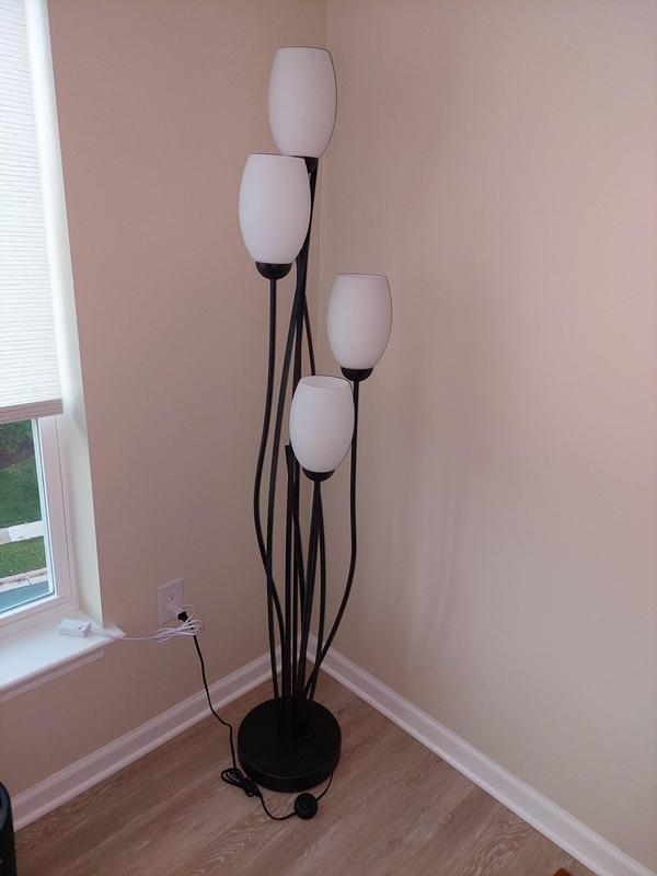 Pole lamp in living room corner