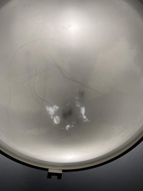 Fake marbelized glass, paint washes off inside of bowl when cleaning dust and bugs.