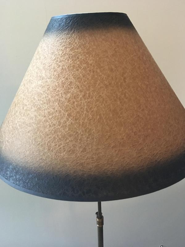 The black rim around the lampshade is very black and very noticeable.