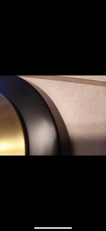 There are multiple dents around the base, and it wobbles a lot.