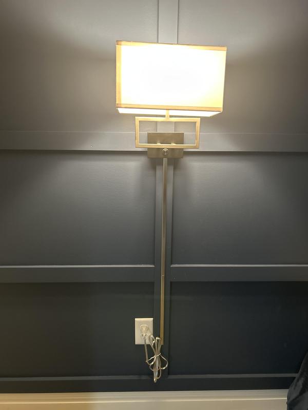 Cord cover below light fixture.