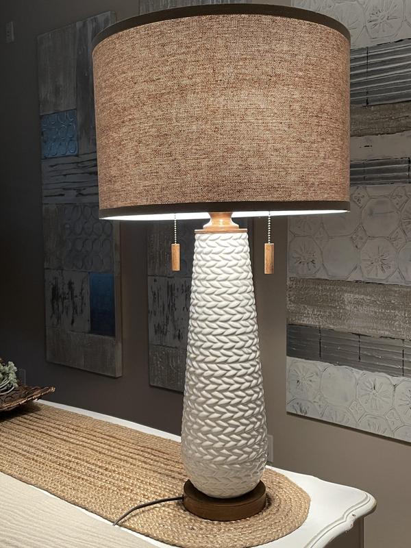 Lit with two 60 watt incandescent bulbs for a warm feel.