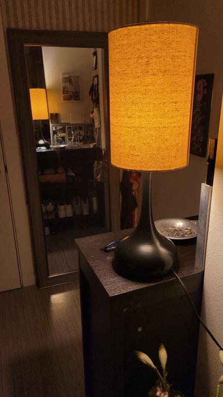 Lovely mood lighting. Illuminates without giving off a glare. Feminine curves with masculine texture