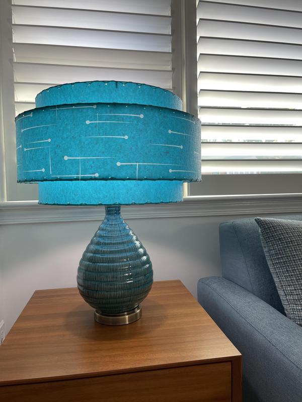 Perfect mid century base for my custom mid century shade.  The color match is pretty good.