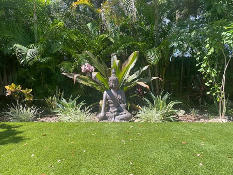 Sitting Buddha in meditation garden