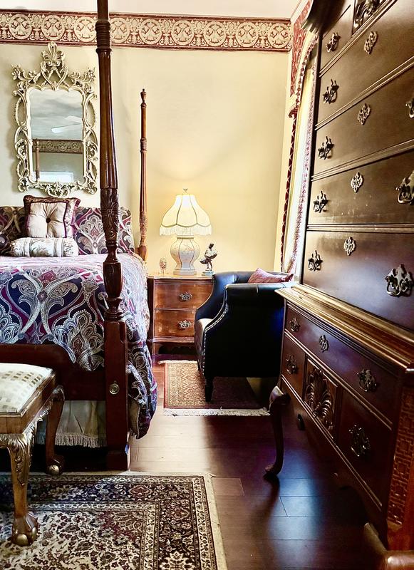 They accented Chippendale  Asia fret work of our traditional bedroom set .