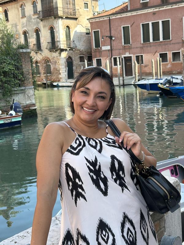 Makeup held up walking the streets of Venice, Italy. It was extremely hot this day.