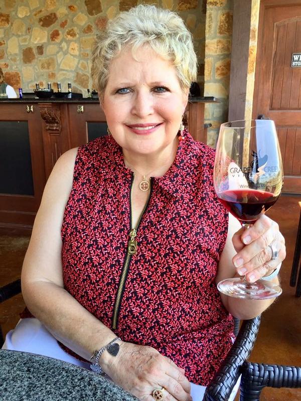 Enjoying a glass of wine with family.