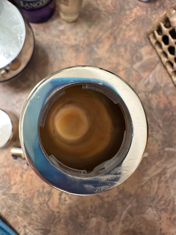 3/4 of the serum is inside the outer container full of glass