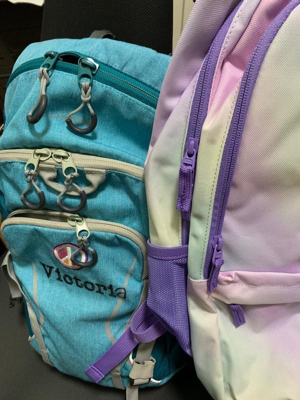Old backpack (L), new backpack (R) - zips