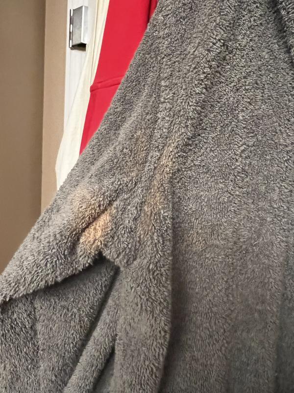 From the outside, stain shows through