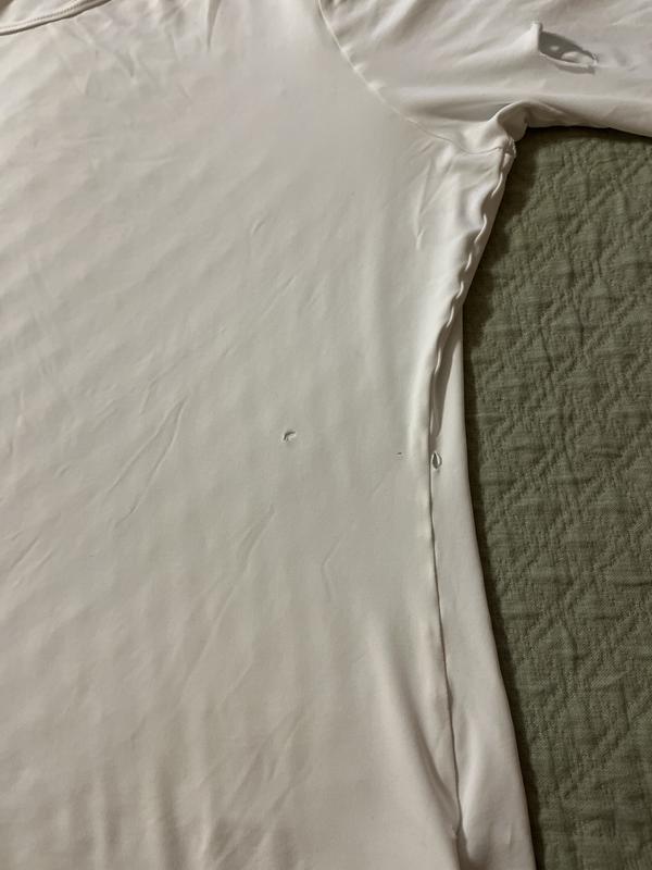 Wholes in shirt
