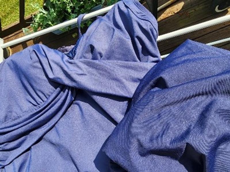 Comparing faded and new Deep Sea Navy bathing suits