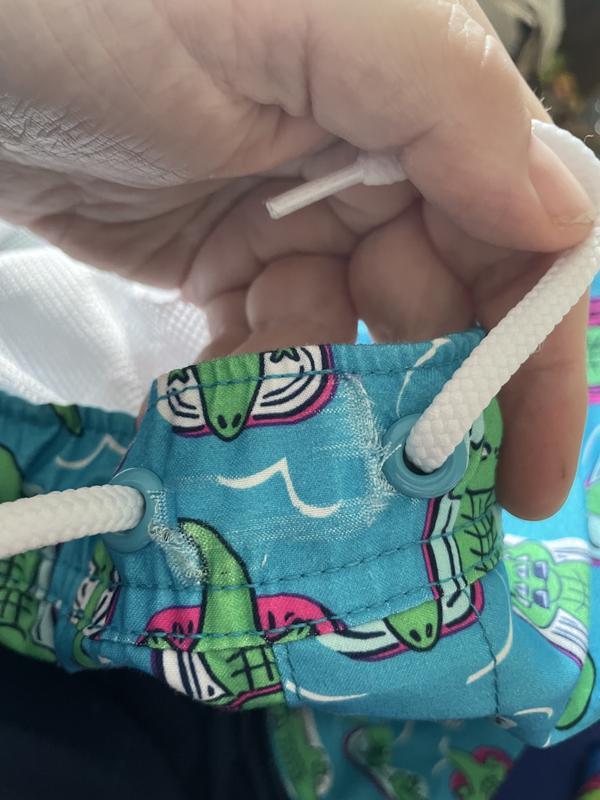 Excessive wear and tear holes near grommets in swimsuits after 2 times worn.