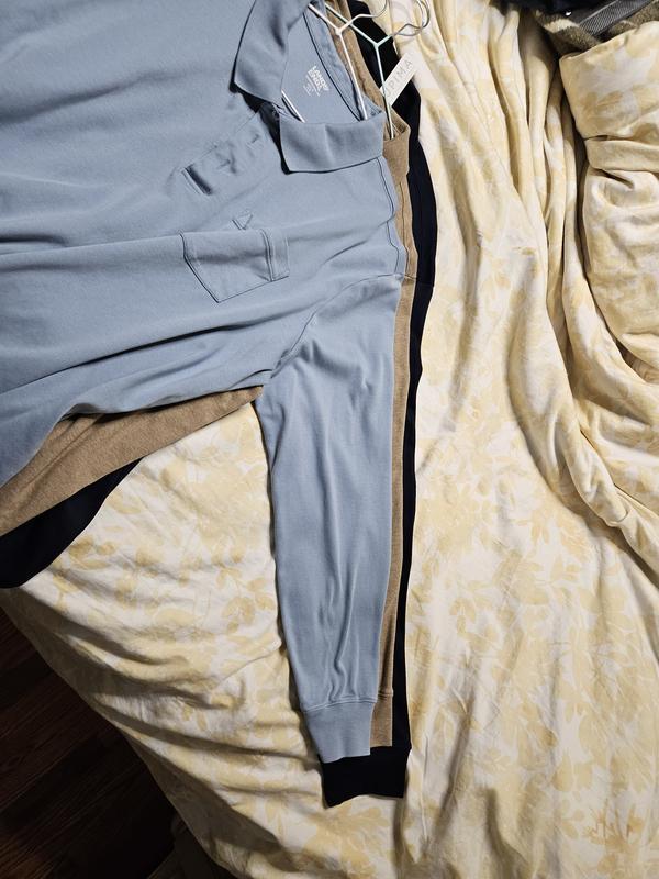 Washed 2x , 2 shirts on top of new navy blue shirt