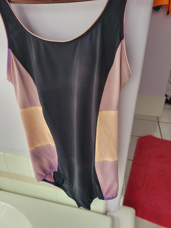 The colors of purple on sides faded drastically. I have another with 100% polyester shell that did not fade.