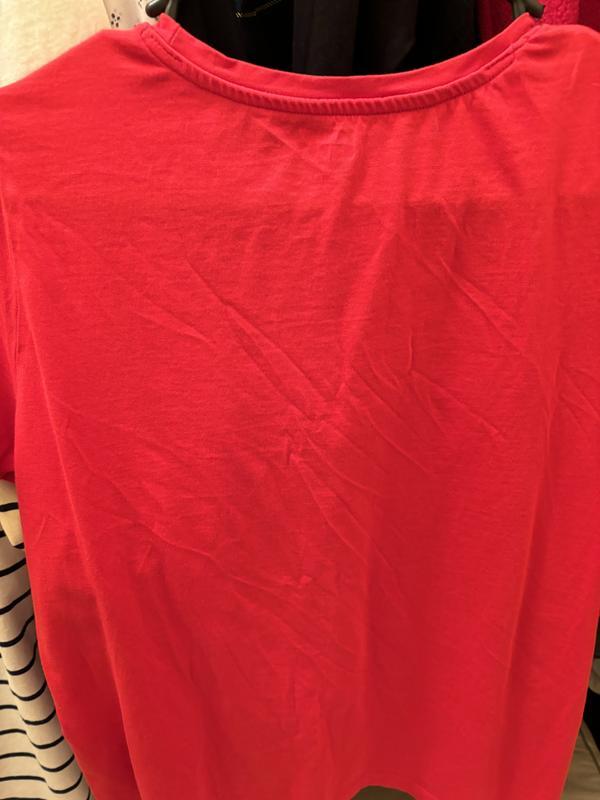 Green shirt older purchase and red shirt new purchase. Hard to see all the wrinkles in the red one but all six come out of dryer the same way and some shrinkage also.