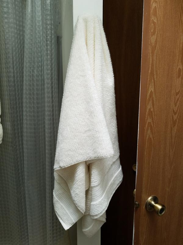 Organic bath towel in Egret (very soft off-white).