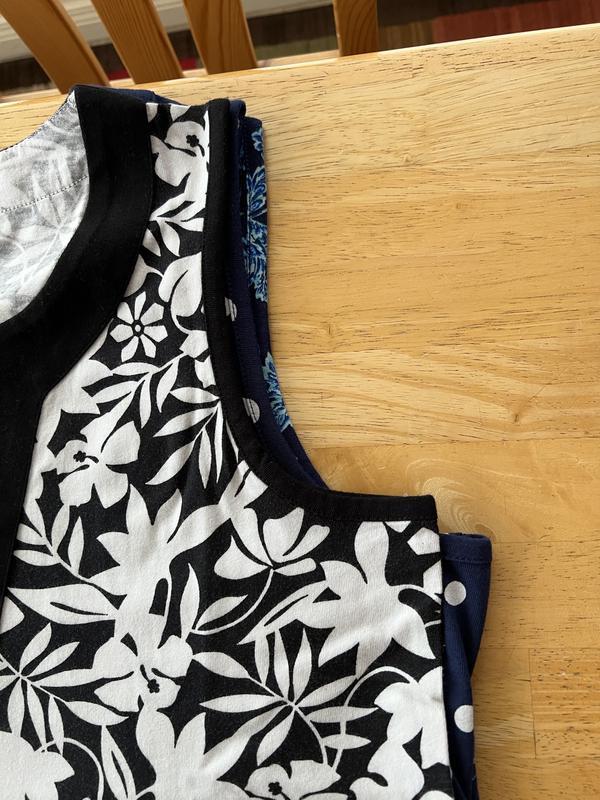 Armholes were perfect on one dress, but the other two prints had much wider and lower armholes, displaying my bra..