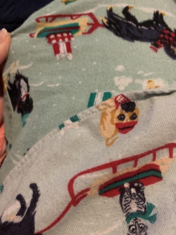 Shirt and pants do not match. Shirt is lighter. Pants are darker.