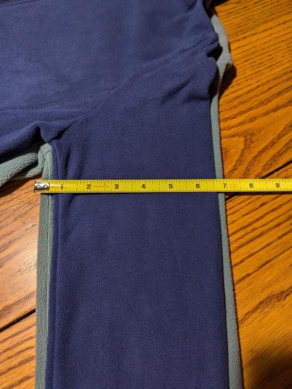 Navy sleeves are 3-4 inches narrower depending on where measured.  TOO TIGHT