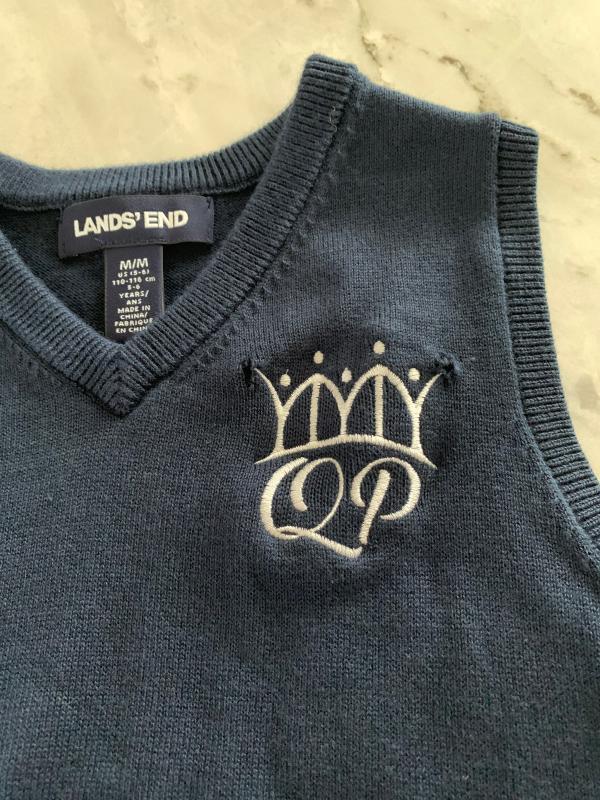 Holes in a Brand New Sweater Vest