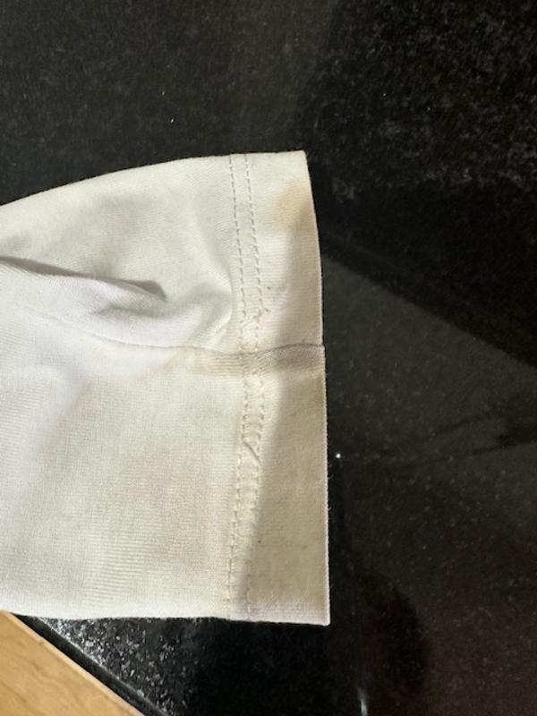Stains on neck and sleeve