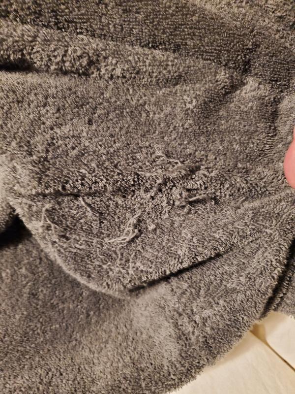 threads coming out on chest area