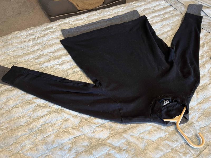 These were exactly the same size before washing them both in cold water.