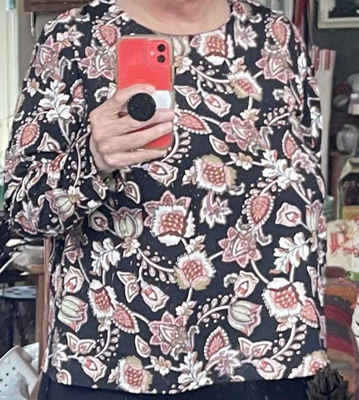 A looser sized shirt that’s not for swimming in.