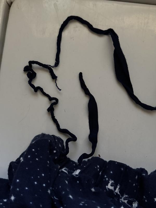 The waist tie on women’s pajamas after one washing