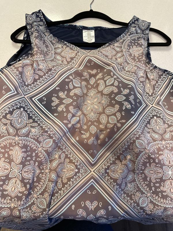 The original color of the navy blue was the same as the inner lining showing above.