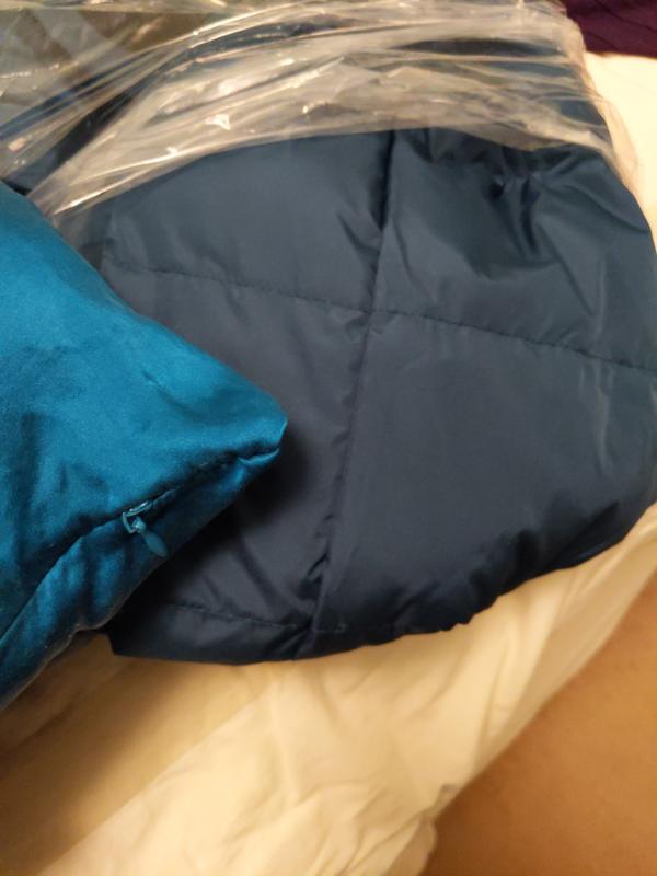 Showing a teal pillow to show how dark it actually is.