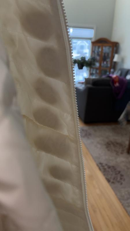 Down fill clumped and did not redistribute destroying insulation