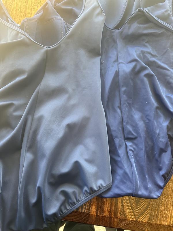 Faded suit on left, new suit on right.