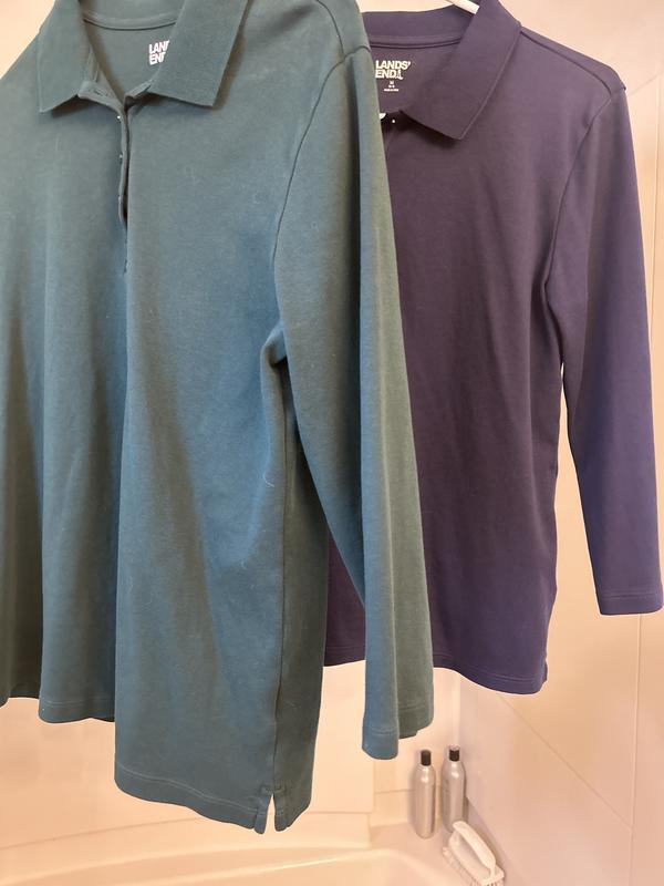 Shirt made in Cambodia is larger and more true to M size than shirt made in Peru.  Even the shoulders and sleeves are narrower on the blue shirt.