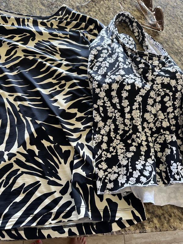 The top in question with another black/white LE top for comparison