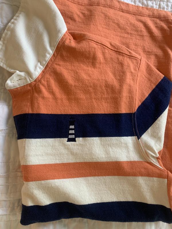 Where the emblem actually ended up. Blends in with the navy stripe too much!