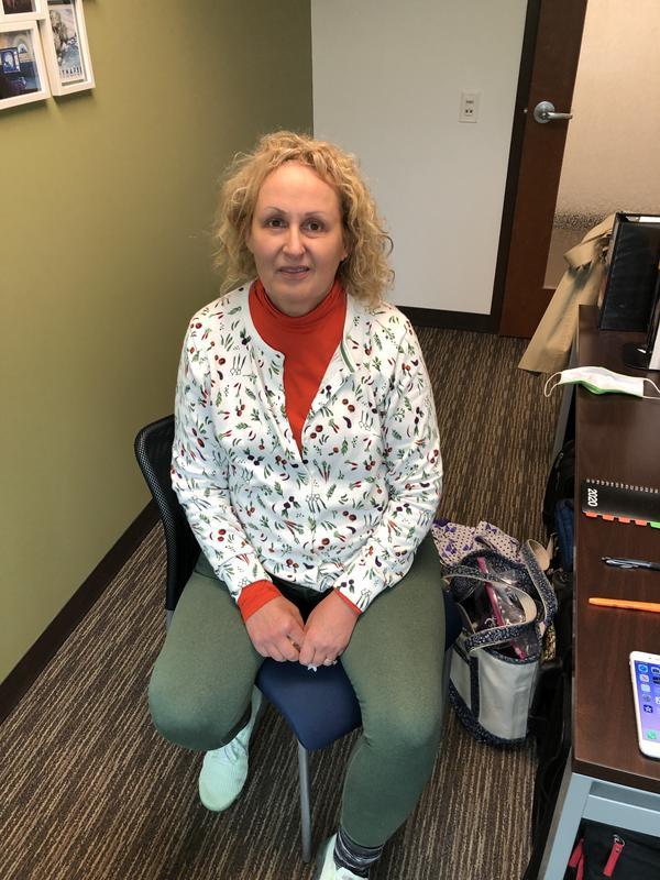 Persimmon with veggie sweater.