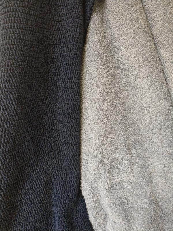 Women's 10-12 in navy on left, men's medium in blue on right