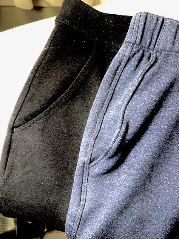 On left, competitor's stretchy pants with proper pockets; on right, this pair of Lands' End with twisty pockets.