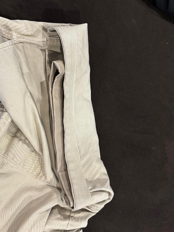 uniform in darker khaki, inside the previous short for comparison