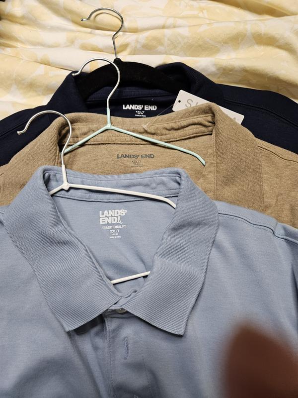 Washed 2x , 2 shirts on top of new navy blue shirt