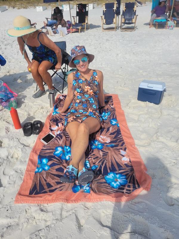 Beach towel, shoes, suit and hat!