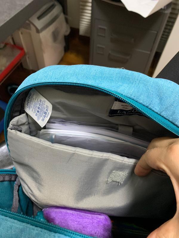 Old backpack with thick inner lining with extra side panel in padded material, taller than A4 size paper