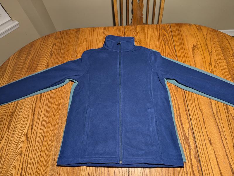 Overall size difference between green and navy.  Both are medium.