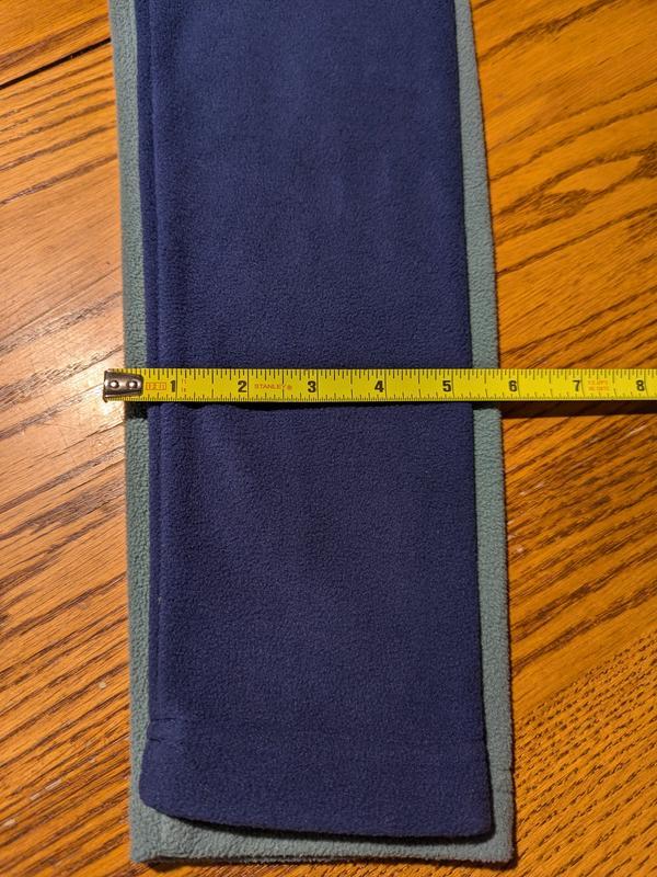 Navy sleeves are 3-4 inches narrower.  TOO TIGHT
