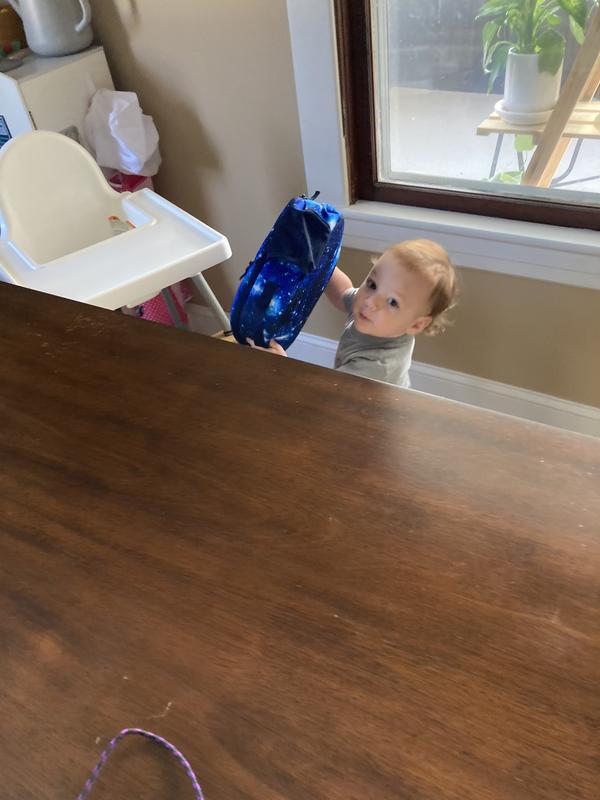 Loves his lunch bag!