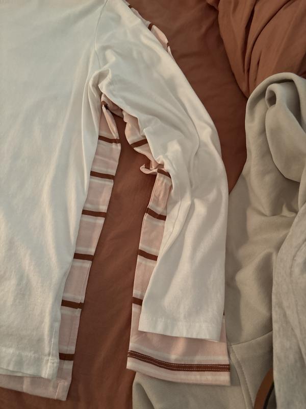 New shirt compared to same item in white.