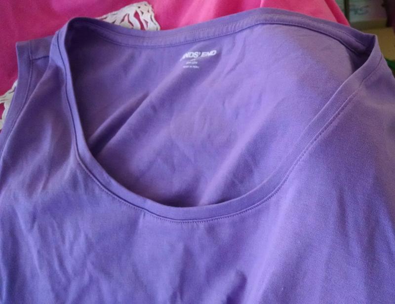 Too large of a neckline. Beautiful color Fresh Lavender.